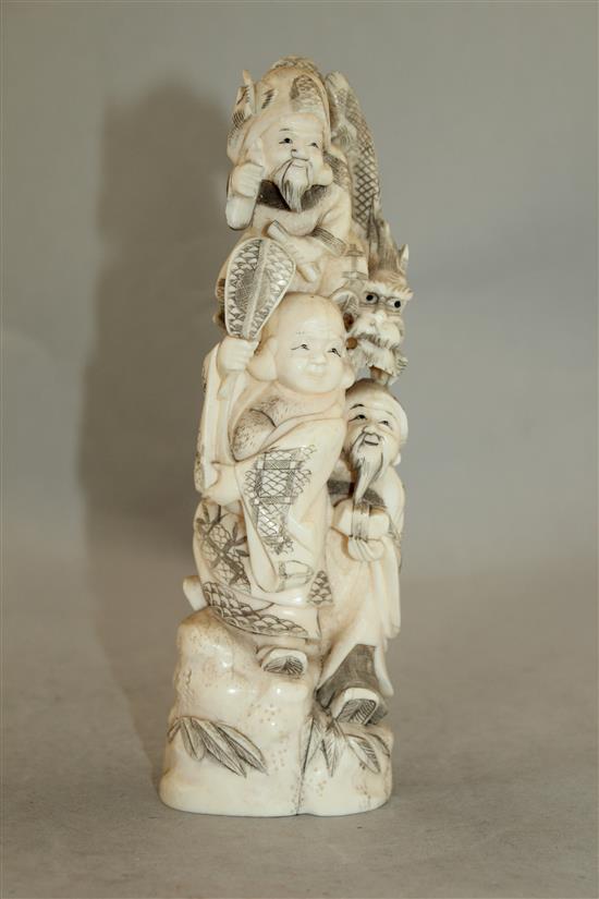 A Japanese walrus ivory okimono, early 20th century, 19cm